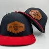 GS Sports Tan Leather Patch PTS20M Hat - Black / Red HEADWEAR